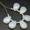 White Chalcedony Faceted Pear Drops Briolette Total 6 Beads and Size 13-14mm approx. Chalcedony is a cryptocrystalline variety of quartz. Comes in many colors such as blue, pink, aqua. Also known to lower negative energy for healing purposes. 